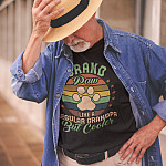 grand-paw-like-a-normal-grandpa-cooler-dog-lover-father's-day-shirt-stylish-white-senior-man-wearing-a-round-neck-tee-mockup-with-a-hat grand-paw-like-a-normal-grandpa-cooler-dog-lover-father's-day-shirt-stylish-white-senior-man-wearing-a-round-neck-tee-mockup-with-a-hat