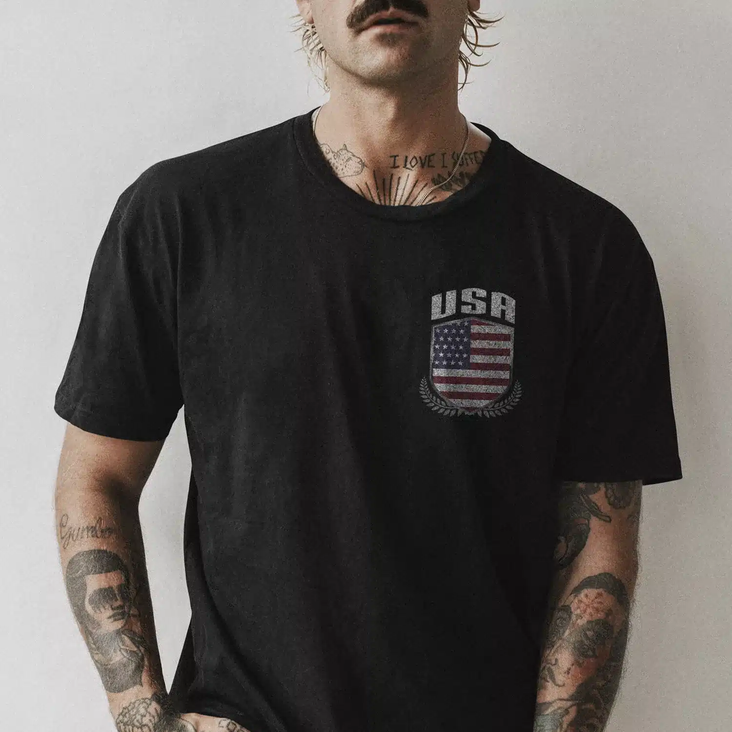 Men's black tee mockup psd on tattooed model