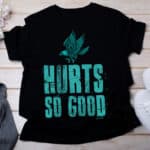 Women’s T-shirt mockup with aran sweater and peony
