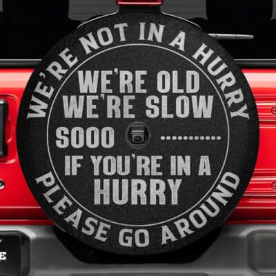 Alternative view of We're Not In A Hurry We're Old We're Slow So If You're In A Hurry Please Go Around Funny Spare Tire Cover